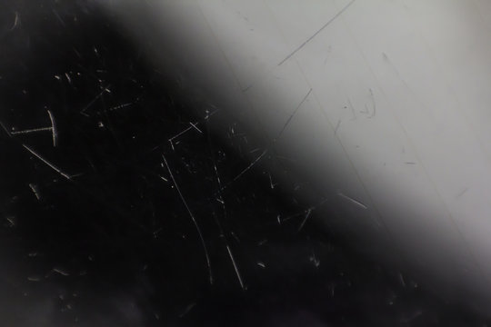 Scratched glass background surface