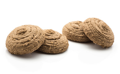 Four oat cookies isolated on white background brown round crispy cocoa.
