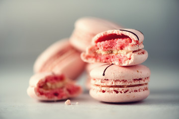 Pink french macaroons. Pastel colors macarons with copy space, top view. Holidays and celebrations concept. Sweet gift for woman, girl