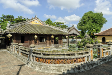 Fototapeta na wymiar palace with pond in the imperial Hue citadel, patrimony of the humanity, in Vietnam.