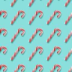 Seamless pattern with candy cane lollypops