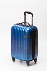 Blue modern suitcase on a white background