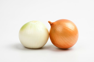 Gold onion vegetable on white background cutout 
