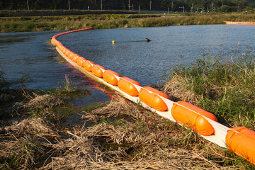 Containment booms in Korean river © papii