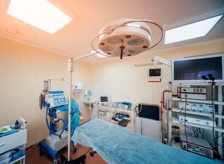 Surgical equipment and medical devices in operating room.