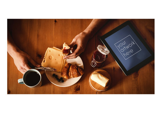 Tablet User Eating Breakfast Food Mockup 1
