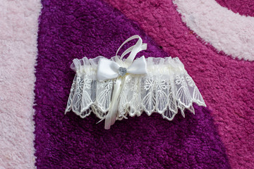 Fototapeta na wymiar white beautiful openwork bandage for bride