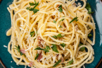 Spaghetti carbonara with egg and pancetta