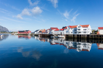 Fototapeta na wymiar White houses in a fishing village, Henningsvaer, Lofoten archipe