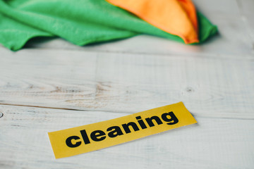Keep your house clean and healthy with a fluffy yellow and green cotton mop. Contrast composition...