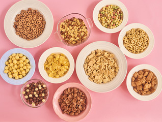 Cereals on pink background
