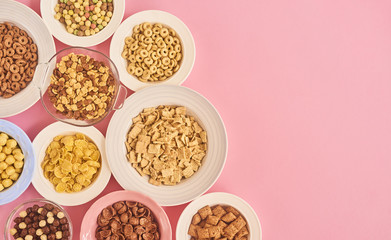 Cereals on pink background
