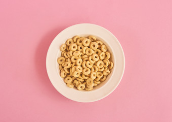 Cereals on pink background