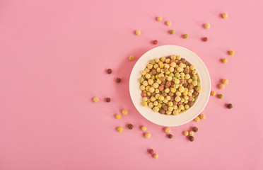 Obraz na płótnie Canvas Cereals on pink background