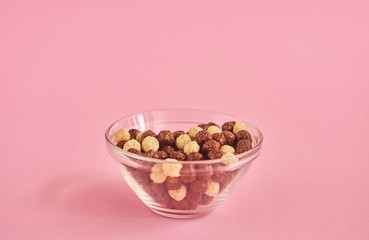 Cereals on pink background