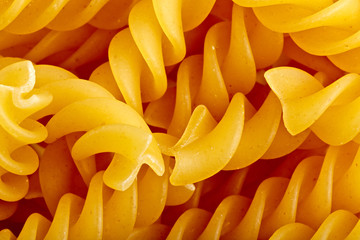 Closeup Italian Fusilli Pasta food background texture