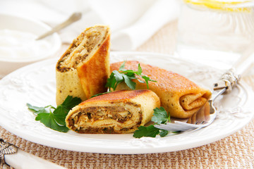 Pancakes stuffed with liver and eggs.