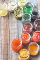 Assortment of sauces in the glass jars