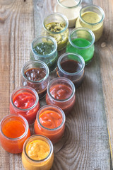 Assortment of sauces in the glass jars