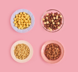 Cereals on pink background