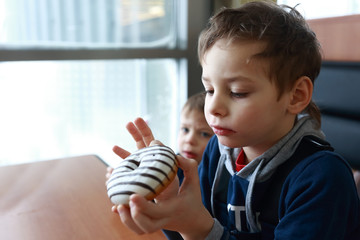 Child eating donut