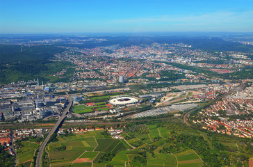 Fototapeta na wymiar Stuttgart - June 11, 2017: Closer Aerial view of Stuttgart area and soccer stadium, south germany on a sunny summer day