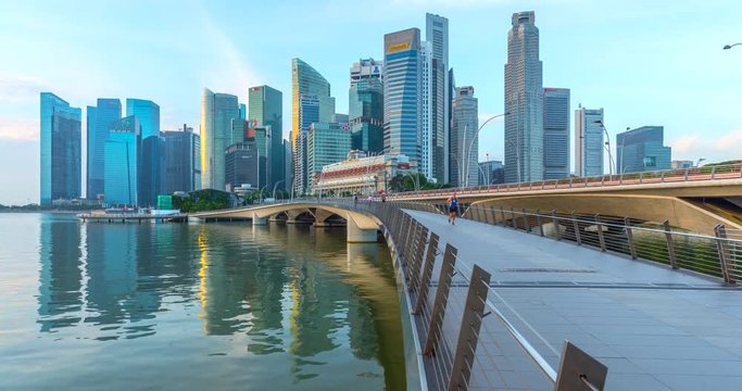 4k Timelapse Sunrise Scene of Singapore City Skyline and Financial district across Marina Bay 