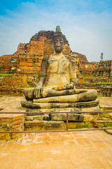 Beautiful outdoor view of the ancient budha at Ayutthaya Historical Park in the ruins of the old city