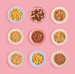 Cereals on pink background