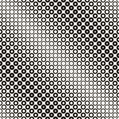 Fototapeta na wymiar Halftone circles vector seamless pattern. Abstract geometric texture with size gradation of rings. Gradient transition effect background,