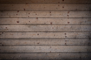 Obraz na płótnie Canvas Vintage wooden boards background with vignetting frame. Grunge wood pattern. Rough panels backdrop. Dirty hardwood background. Natural material wall. Old weathered wood planks. 