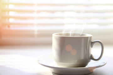 Coffee cup near window