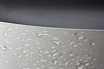 Closeup drops of water on the car after rain