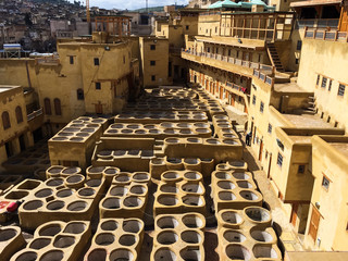 Dye reservoirs in tannery in Fes, Morocco, where the world famous moroccan leather is made