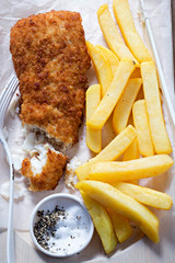 Battered cod with fries. Fish and chips