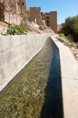 Fototapeta premium Falaj watering system in Birkat Al-Mawz. The town is a village in the Ad Dakhiliyah Region of Oman. It is located at the entrance of Wadi al-Muaydin on the southern rim of Jebel Akhdar.