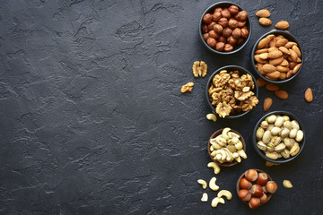 Fototapeta na wymiar Assortment of nuts - healthy snack.Top view with copy space.