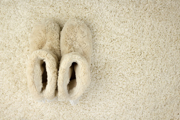 Slippers on carpet. Comfort zone