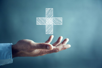 man touching plus or cross sign in screen