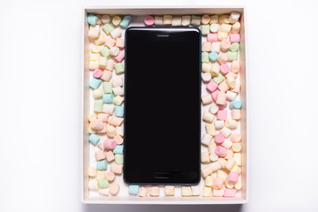 Smart phone in candy box