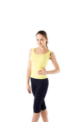 Fototapeta premium Fitness woman in sport style standing. Isolated.