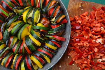 Ratatouille. Vegetable dish. Peasant food. Vegetables, cut into slices. Zucchini, pepper, tomato,...
