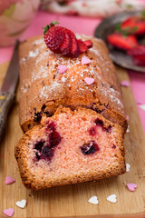 Sweet pink dough cake with strawberries and berries