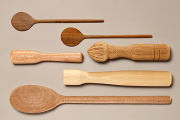 Wood Spoon and Pestle Collection isolated on Grey Background with Real Shadow. Top View
