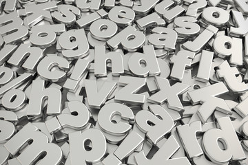 Piled of gray metallic alphabet fonts