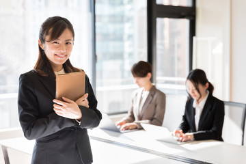 asian businesswomen working in office