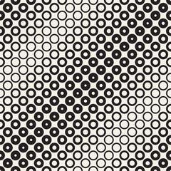 Halftone circles vector seamless pattern. Abstract geometric texture with size gradation of rings. Gradient transition effect background,