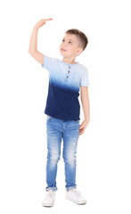 Little boy measuring height on white background