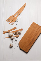 Fototapeta na wymiar Fresh sliced garlic in glass bowl on wooden background.