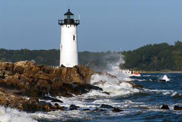Portsmouth Lighthouse Guiding Fishing Boat Over Crashing Waves